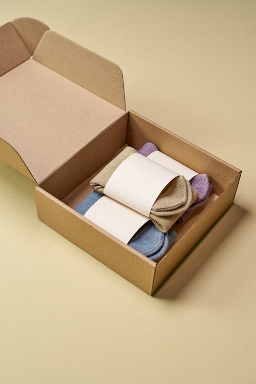 Brown Cardboard Box With White Tissue Paper