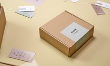 Brown Cardboard Box on White Table