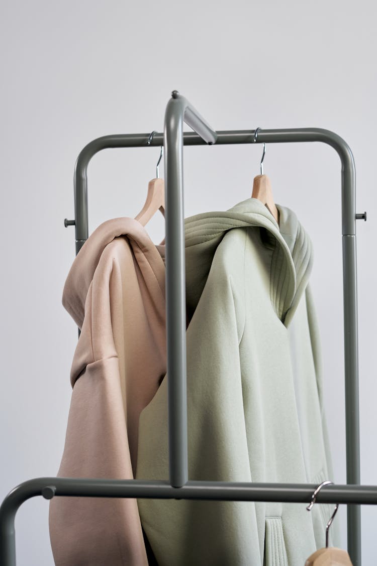 Hoodie Sweaters Hanged On A Clothes Rack