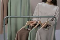 A Woman Shopping for Blouses