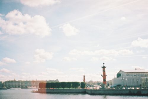 Free A stunning view of a city waterfront with historical buildings and clear skies. Stock Photo