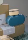 Blue and White Plastic Container