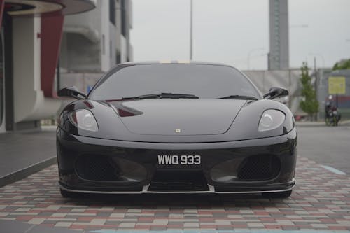 A Black Ferrari Parked on the Street