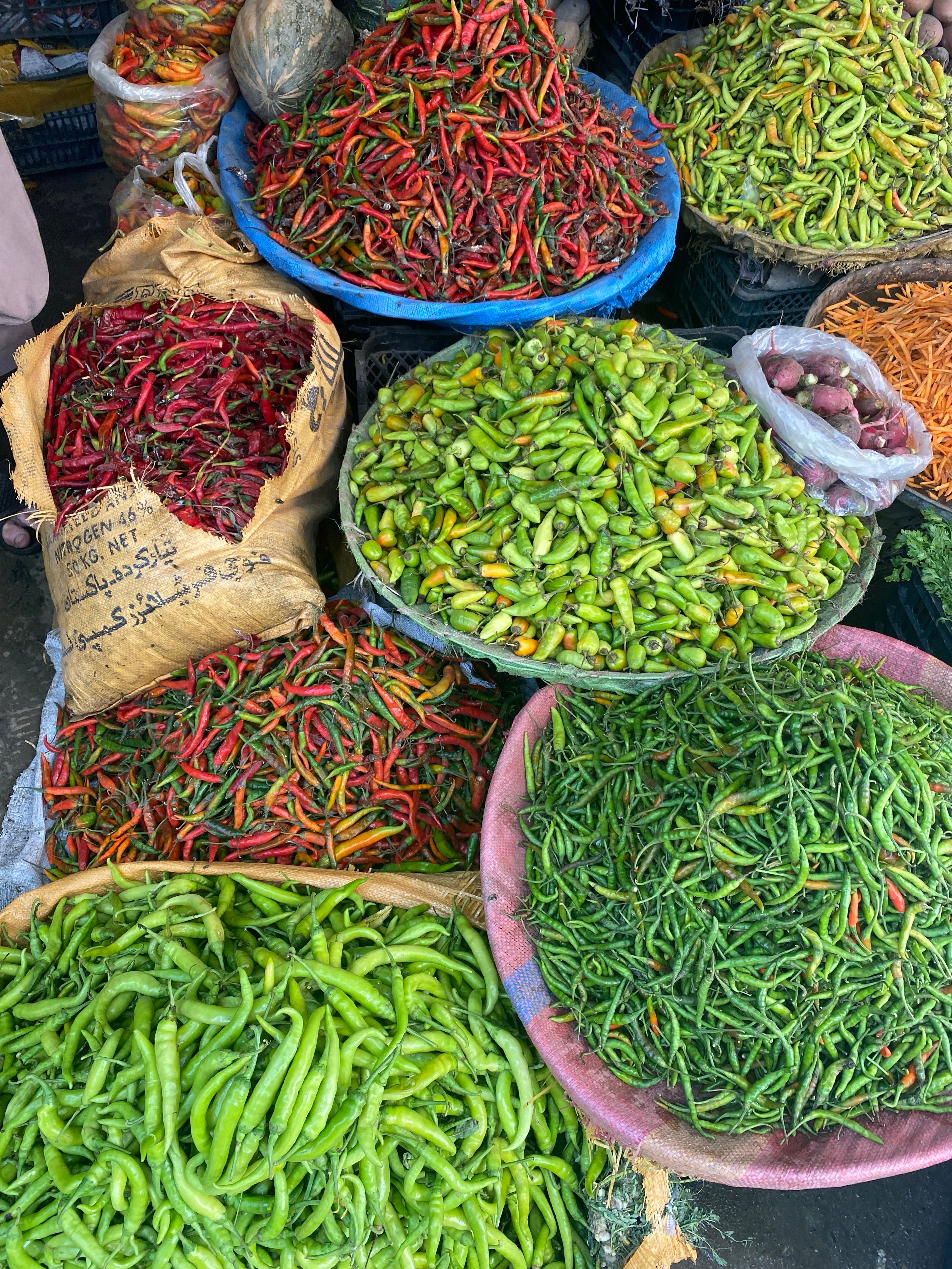 A Bunch of Green and Red Chili Peppers · Free Stock Photo