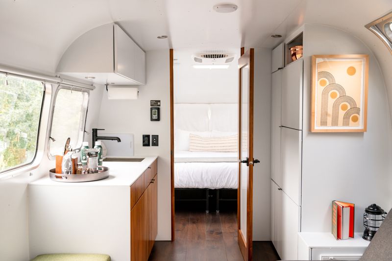 Sleek and modern interior design of a mobile home in Falmouth, showcasing minimalist decor.