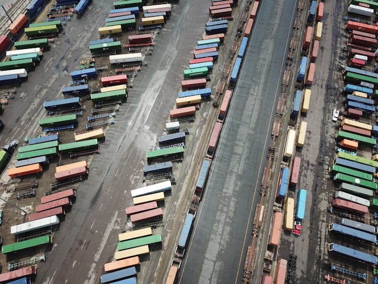 Aerial View Of A Parking Lot With Cargo Containers 