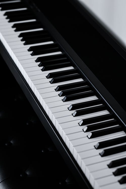Kostnadsfri bild av akustisk, elektriskt piano, högvinkelskott