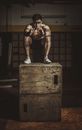 Man in White Shorts Standing on Brown Wooden Box