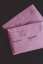 White Envelope on Black Textile