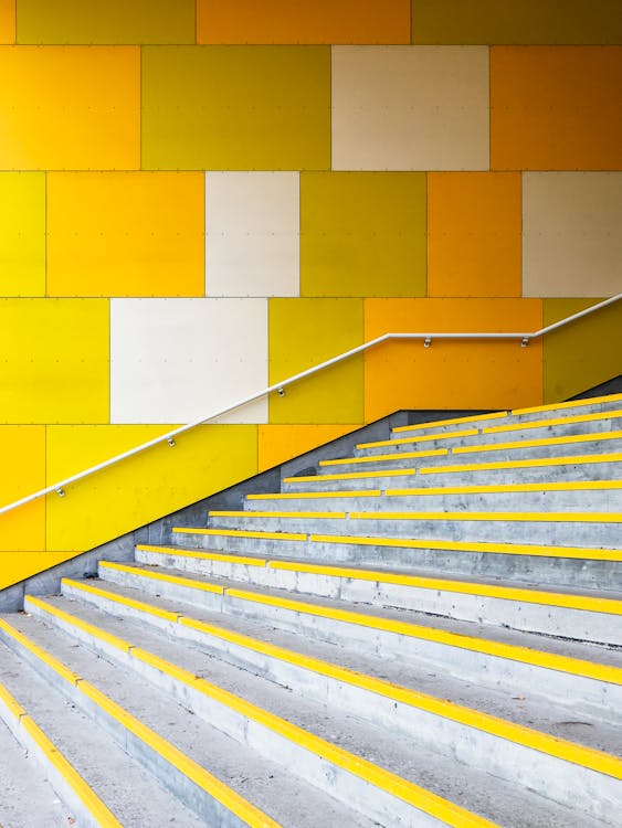 Yellow and White Concrete Staircase