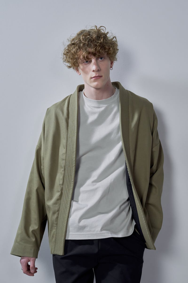 Man in Green Zip Up Jacket