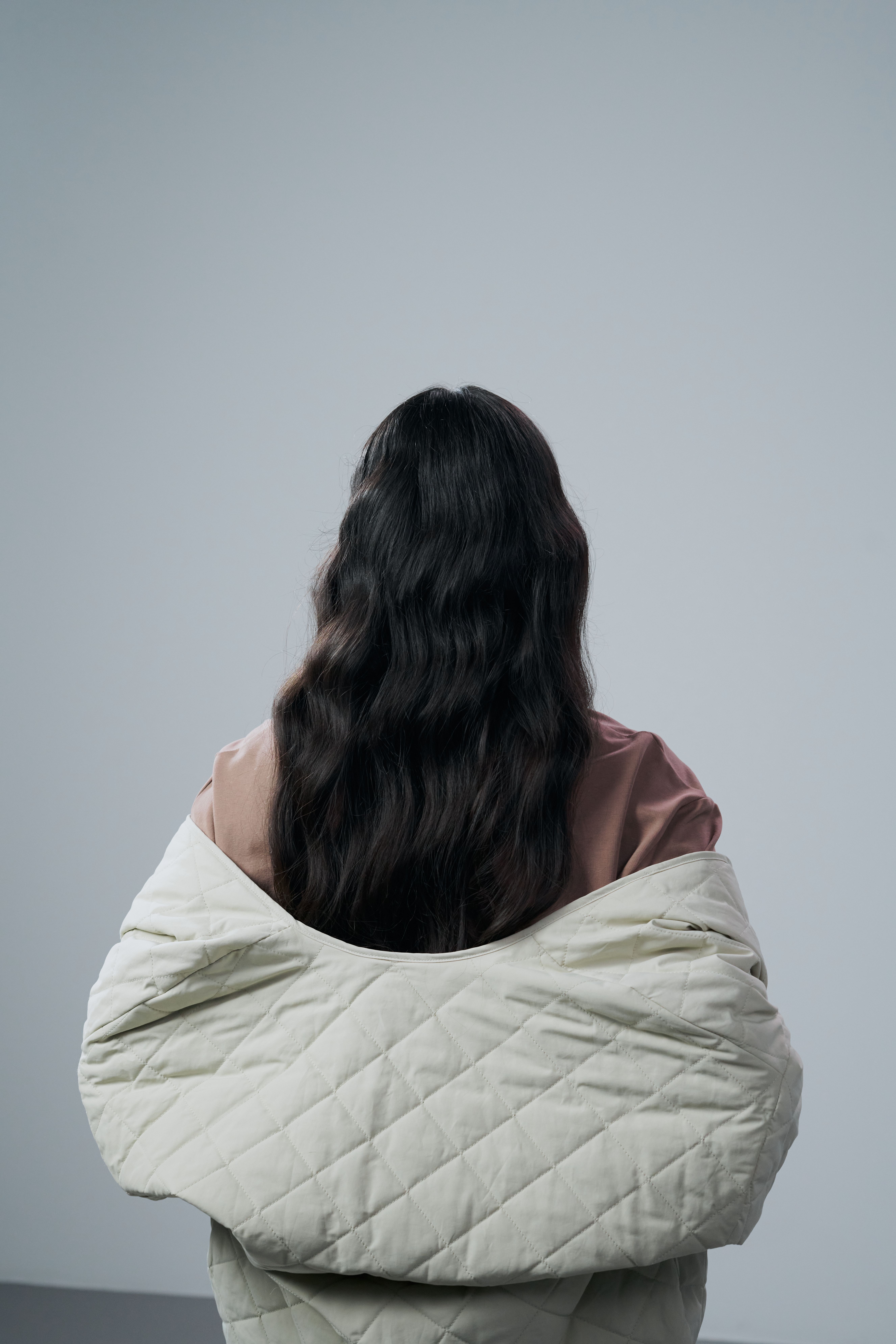 Back View of a Woman with Brown Curly Hair · Free Stock Photo