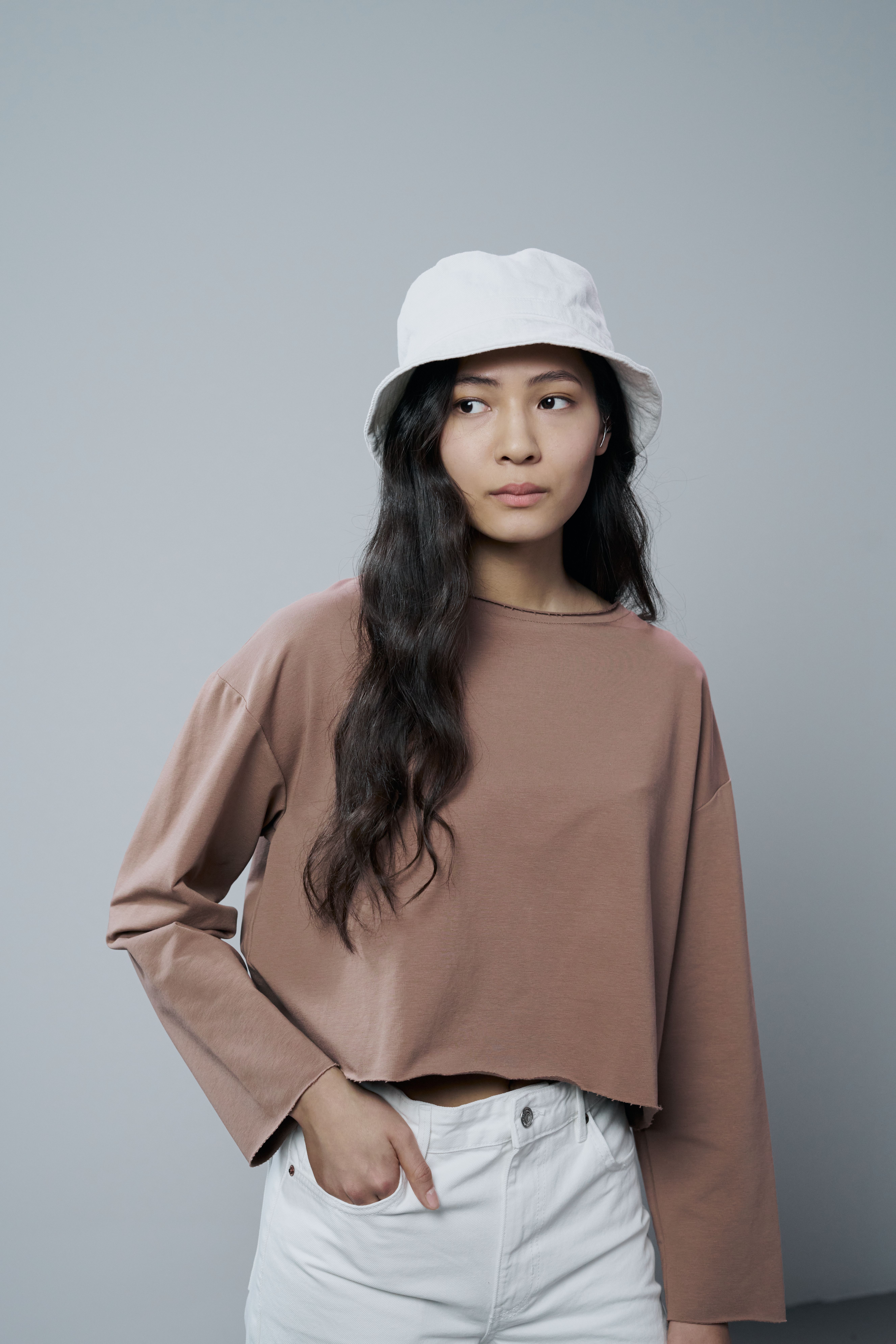 A Woman with Her Hand in Her Pocket · Free Stock Photo