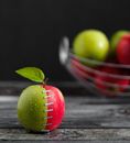 Photograph of a Stapled Apple