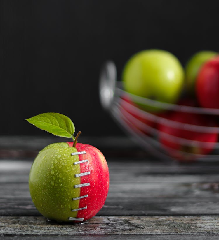 Photograph Of A Stapled Apple