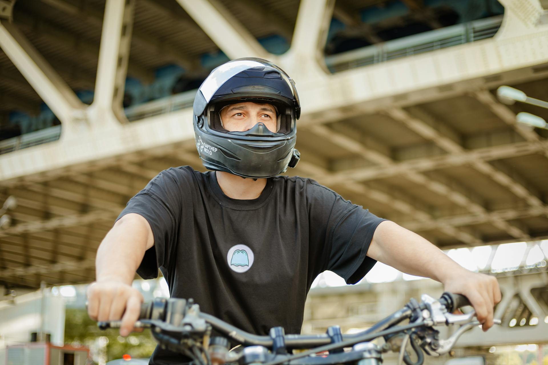 Close-Up Shot of a Man Riding a Motorcycle