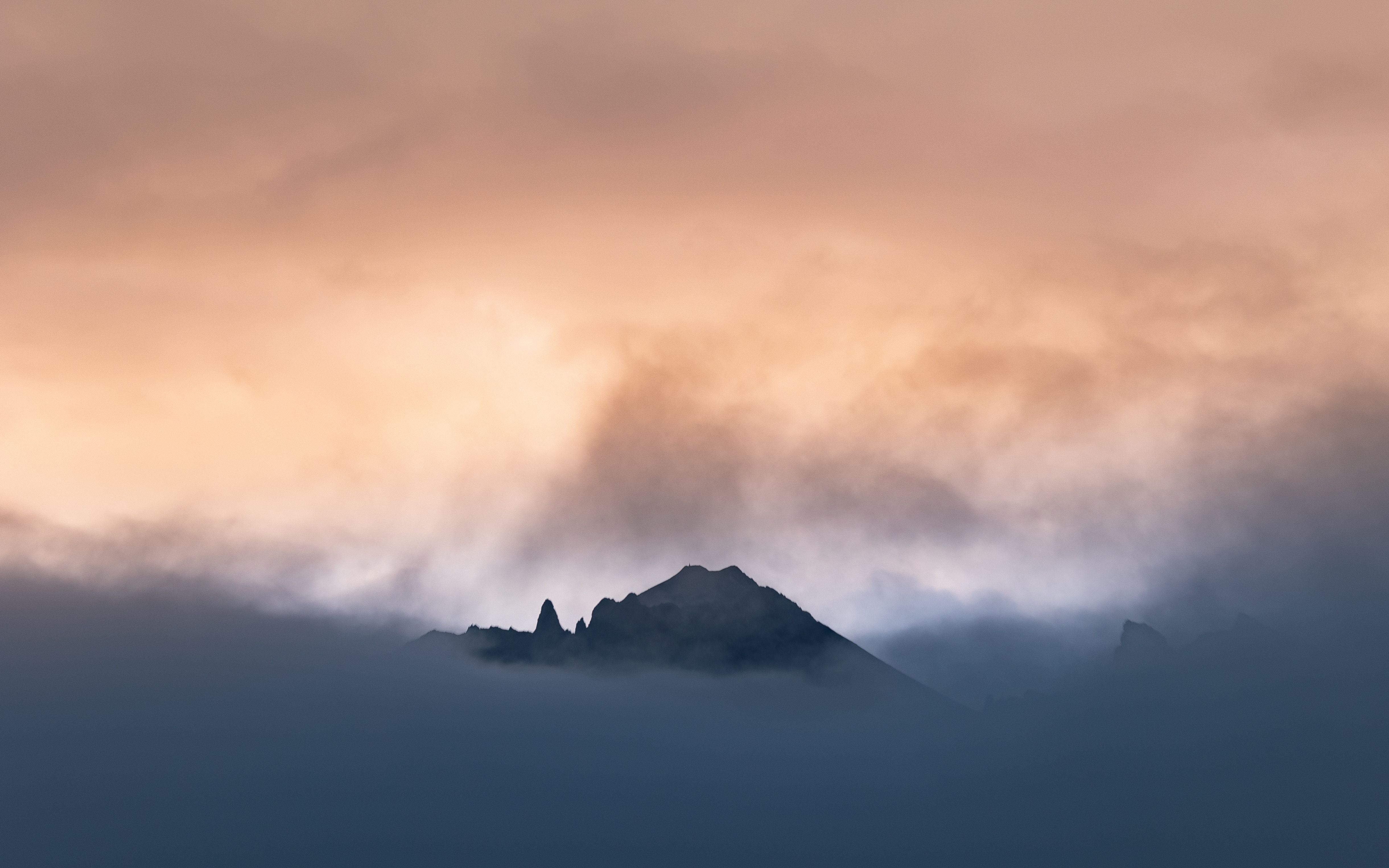 Capture of misty mountain peaks against a dramatic Icelandic sunrise.. capture, misty, mountain