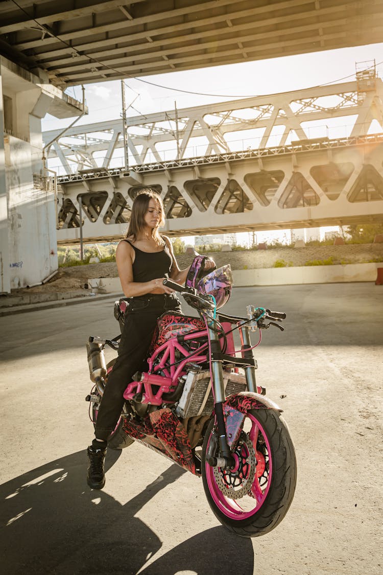 Woman Riding A Motorcycle