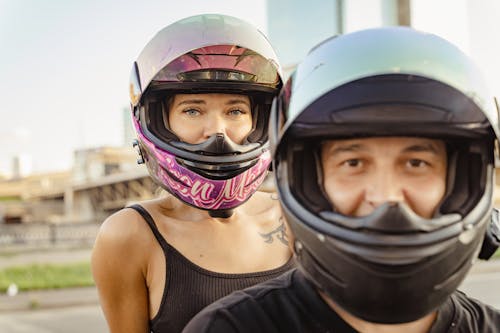 Man and Woman Wearing Safety Helmets