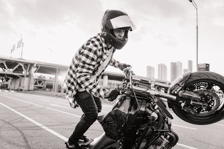 Man Doing Stunts On His Motorcycle