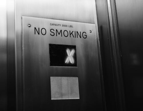 Free stock photo of elevator, signs, tags Stock Photo