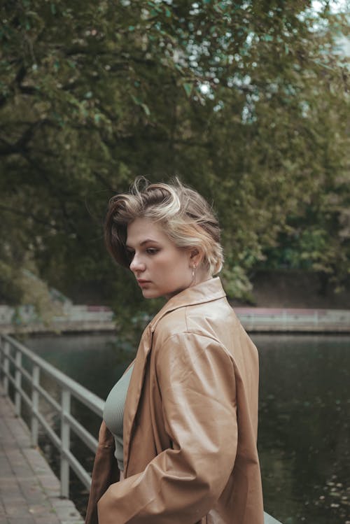 A Beautiful Woman Wearing Brown Leather Jacket