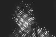 Grayscale Photo of a Woman in Close Up Shot