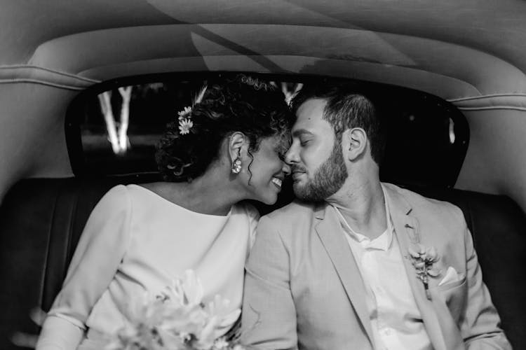 Newlywed Couple Inside A Car