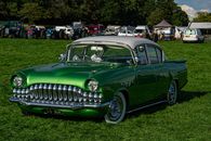 Green Classic Car on Green Grass Field