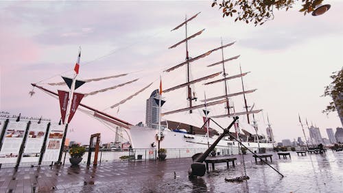 A Sailboat Docked in a Harbor