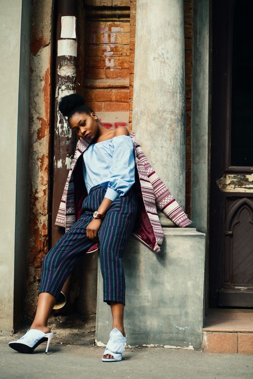 Free Stylish portrait of a woman posing against an urban backdrop in Kharkiv. Stock Photo