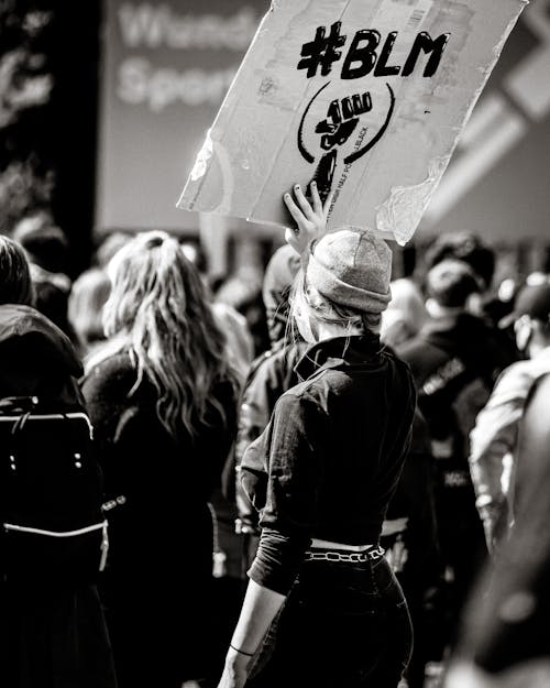 People Raising Poster on Protest