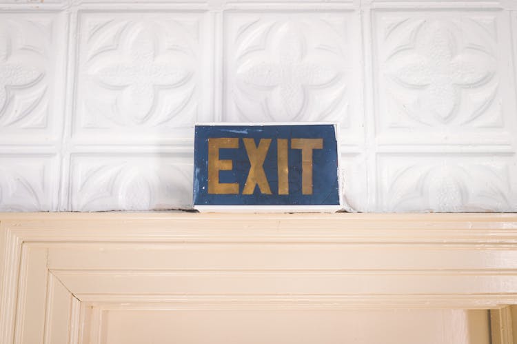 Old Exit Sign Above Doors