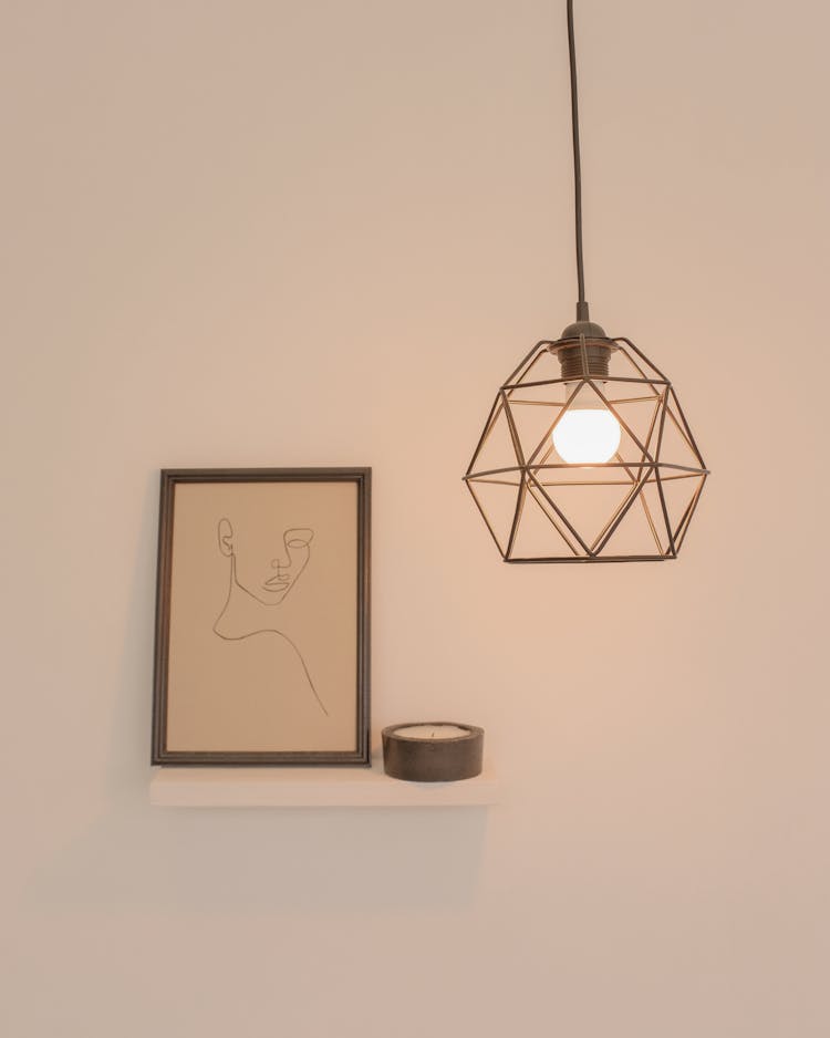Geometric Lamp And Painting In Home Interior