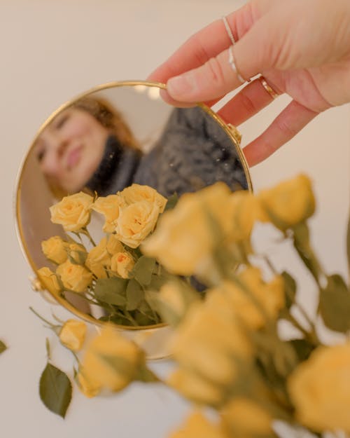 Woman Face in Mirror with Flowers