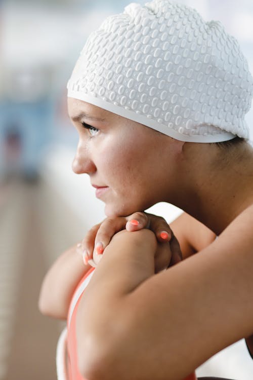Woman in White Rubber Swimming Cap