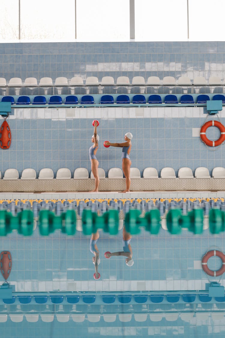 Two Women In Swimming Pool