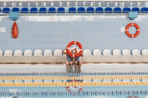 Two Women Holding a Lifebuoy