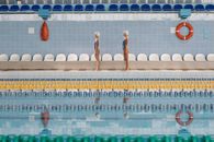 2 Women in Swimming Pool