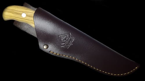 Free stock photo of leather, pocket knife, rivet