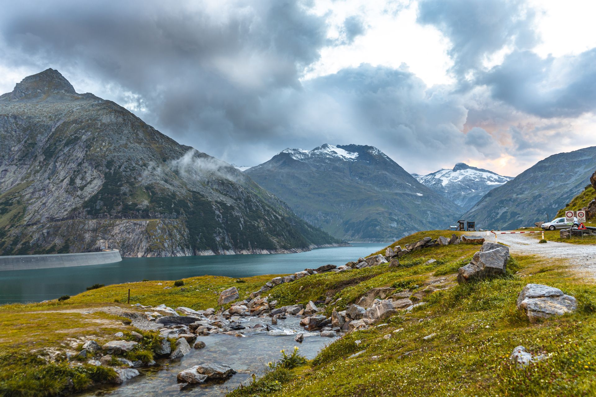 Dramatic view of a mountain landscape with a serene lake in Austria's Malta region.