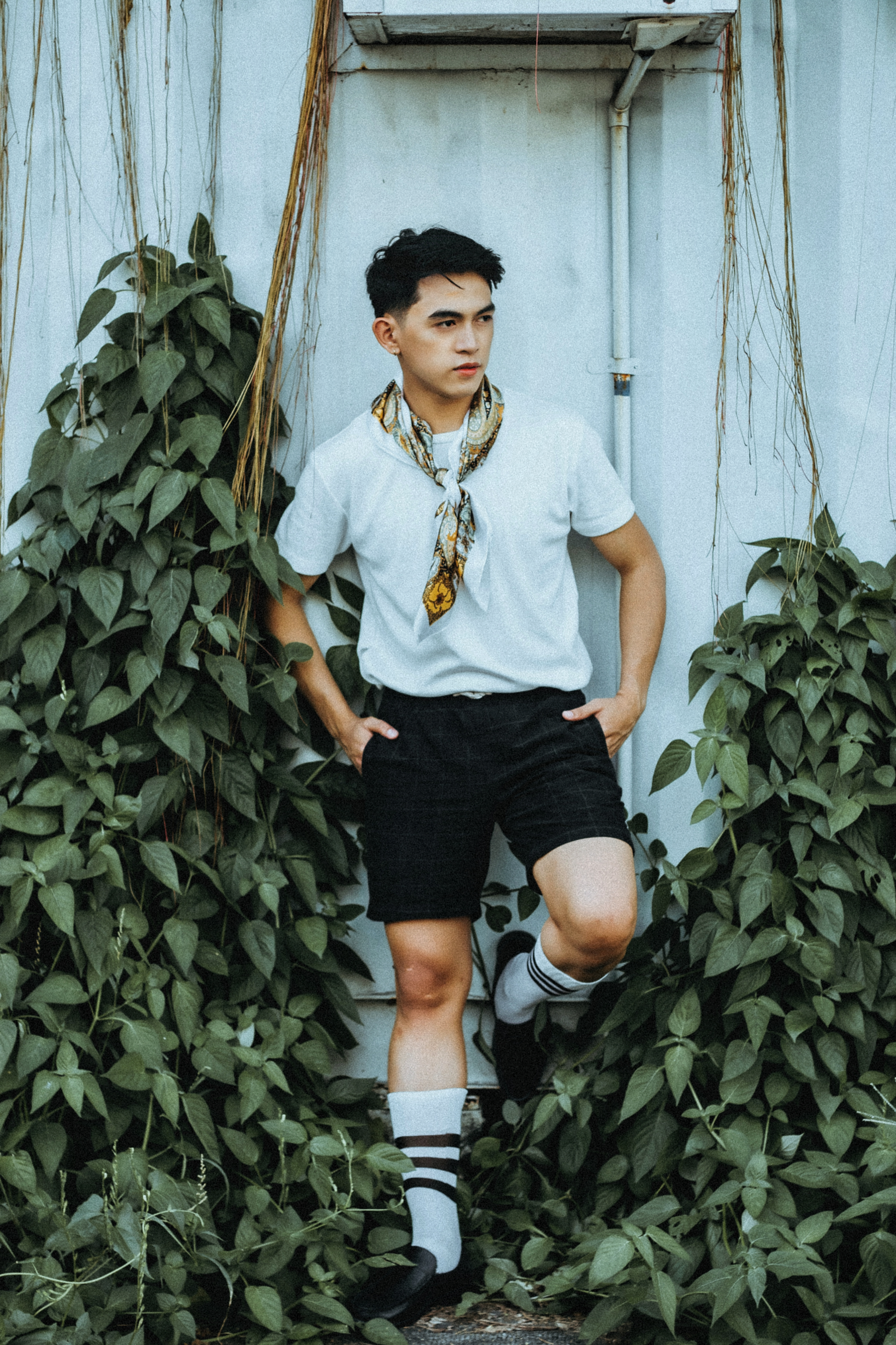 A Man in White Shirt and Black Shorts · Free Stock Photo