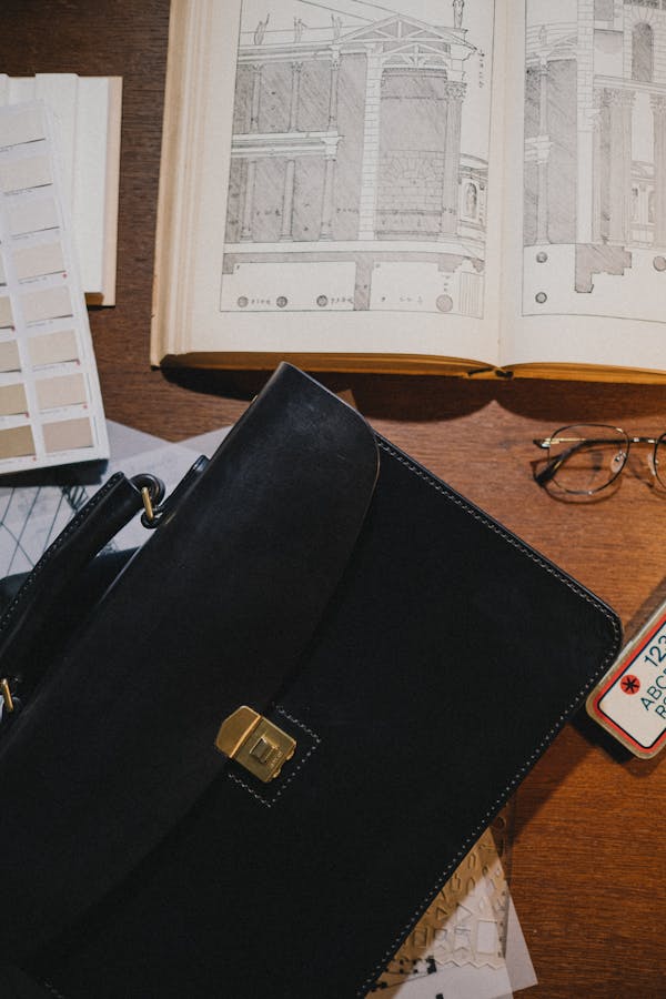Close up on bag on deck with drawing accessories