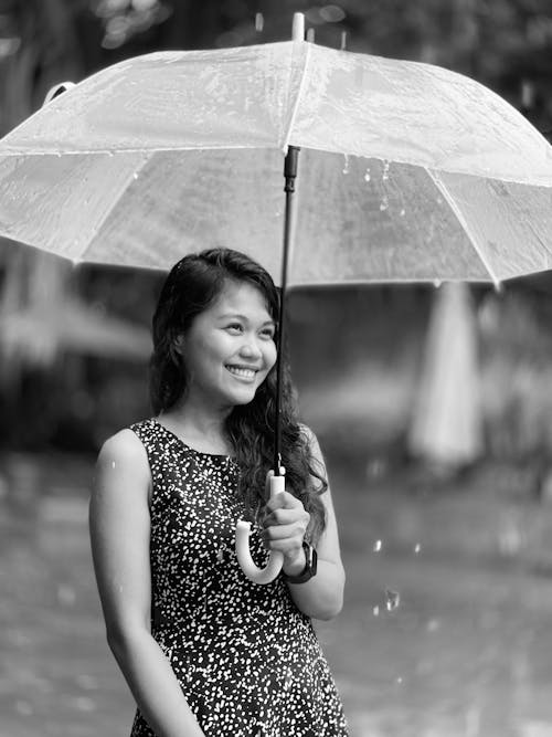 Free Grayscale Photo of a Woman Holding Umbrella Stock Photo