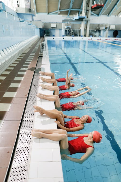 Group of Women Practicing in the Swimming Pool