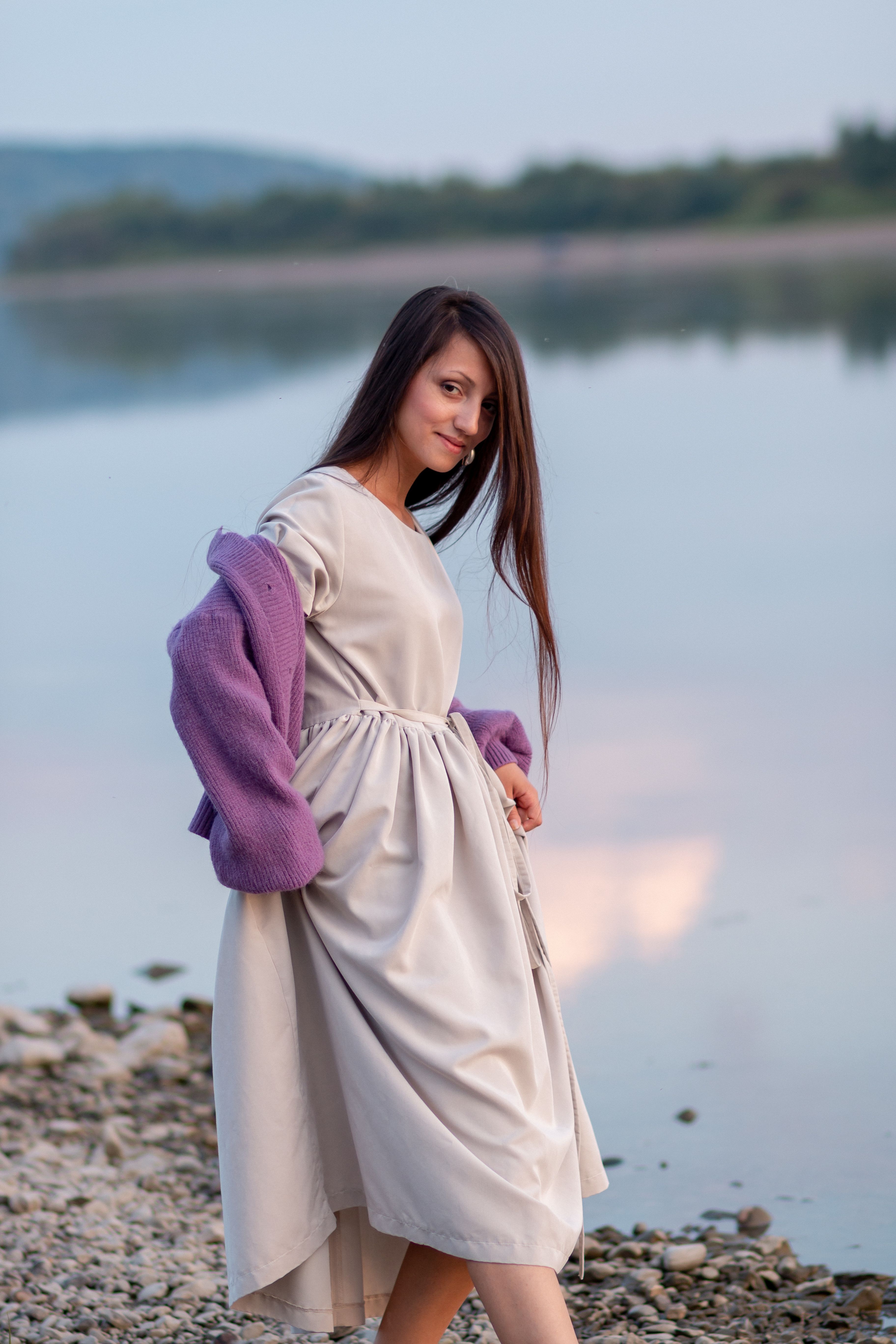 Woman Standing Near Body of Water · Free Stock Photo