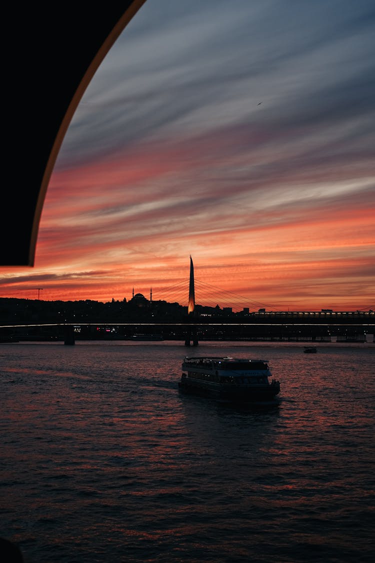 Ship In City Bay During Dusk