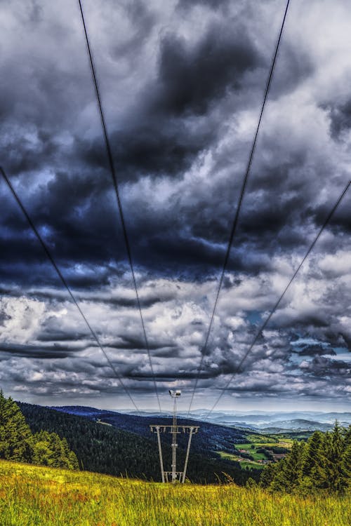 Free stock photo of bavarian forest, chairlift, clouds
