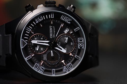 A Black Chronograph Wristwatch in Close-up Shot