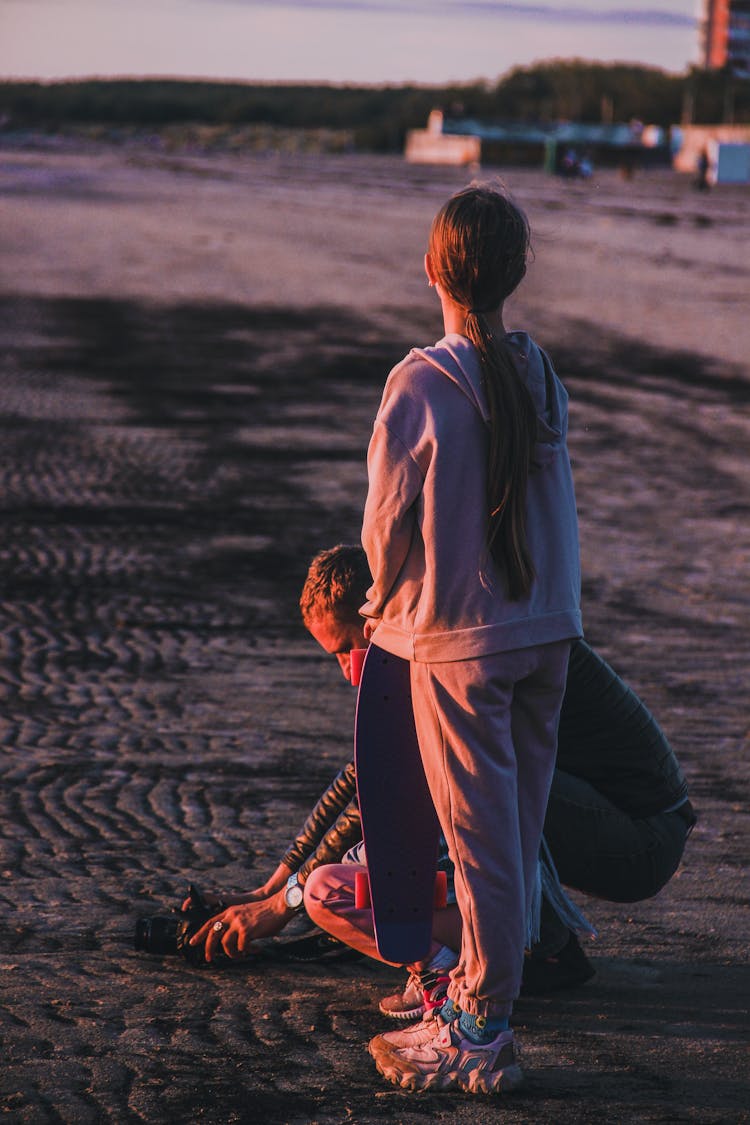 Girl In Hoodie At Dusk